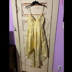 Size 5 prom dress, never worn, has pockets.